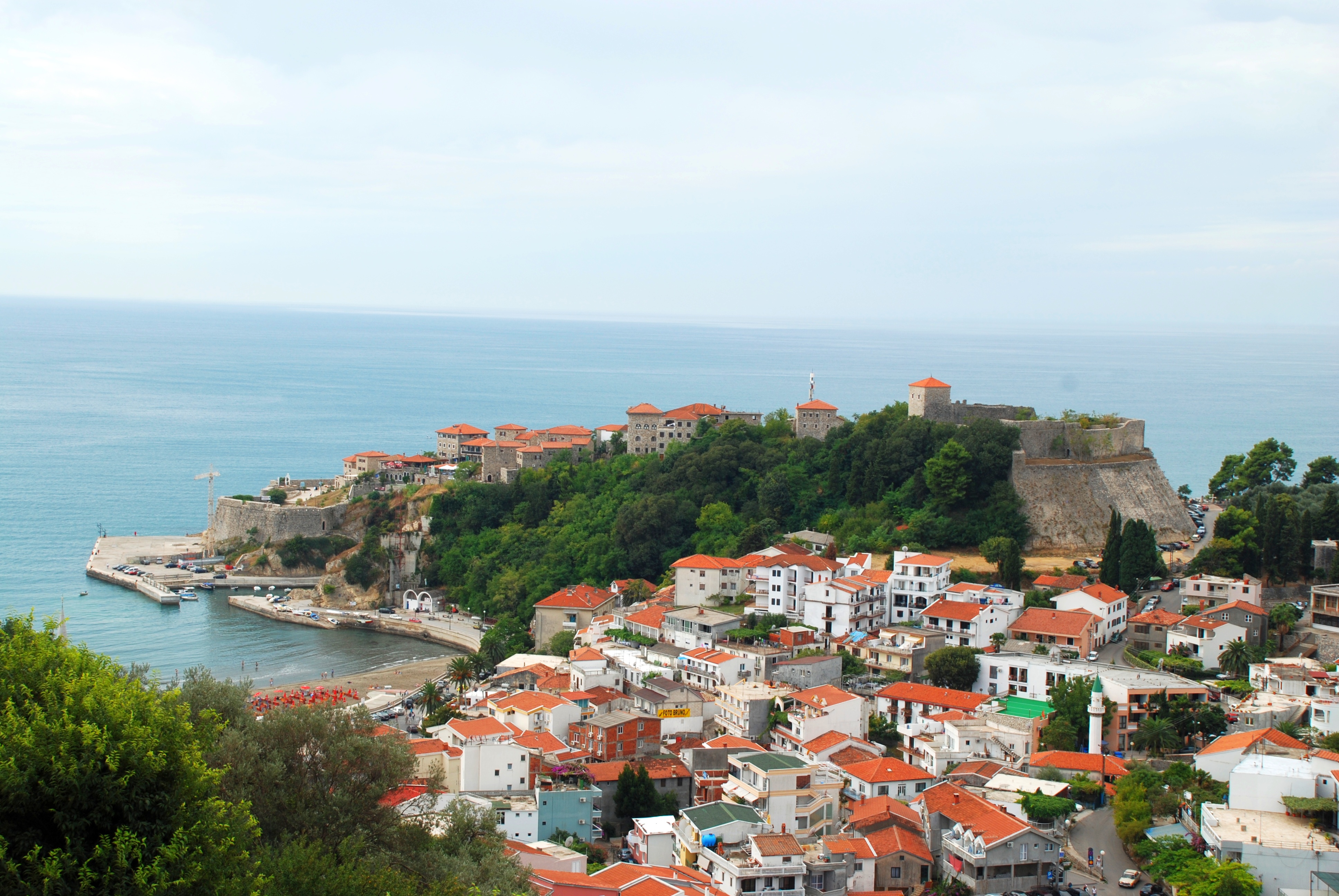 A stunning view of Ulcinj’s Old Town and fortress above the Adriatic Sea.