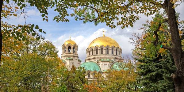 A cathedral in Sofia with autumn leaves.