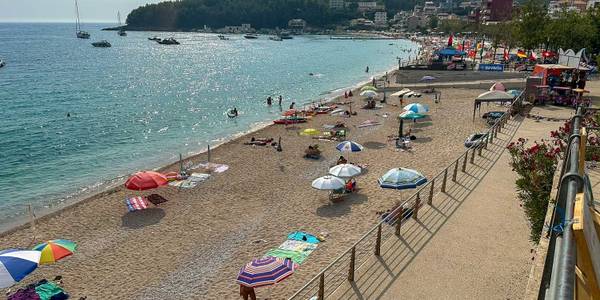 Himara beach full of umbrellas