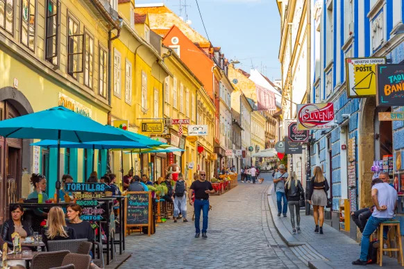 A lively street full of cafés, colors, and charm