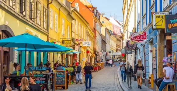 A lively street full of cafés, colors, and charm