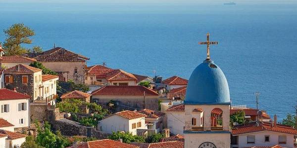 Dhërmi village with its iconic church and stunning views of the Ionian Sea.