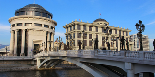 Famous bridge in Skopje with statues and beautiful architecture.