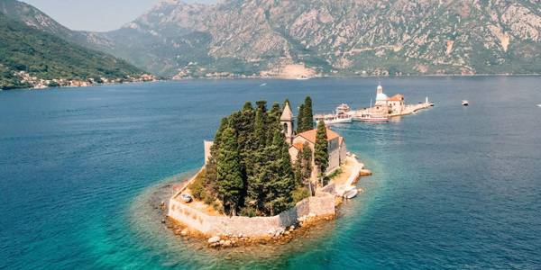 A beautiful artificial island in the Bay of Kotor, home to a historic church and museum.