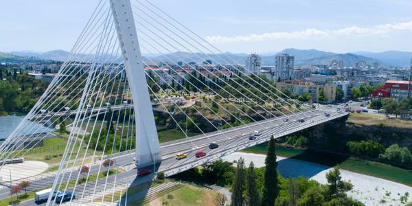 The Millennium Bridge, one of Podgorica’s landmarks, spans the Morača River with its sleek cable-stayed design.